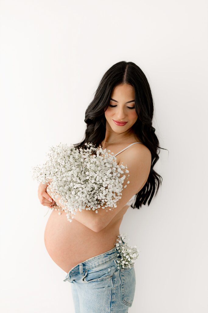 Intimate pregnancy photoshoot in Loveland studio with a Colorado maternity photographer.
