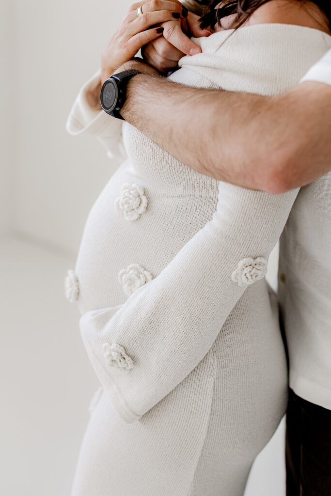 All-white Colorado maternity photography setup designed for timeless and comfortable portraits.