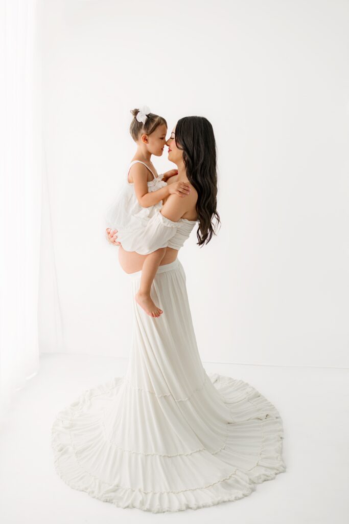 Colorado maternity studio pictures focused on authentic emotion and simple styling.