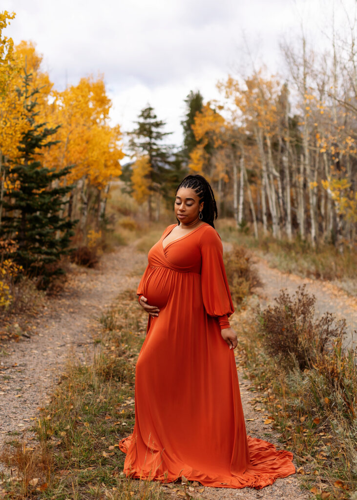 Rocky Mountain National Park maternity photos highlighting connection, movement, and the natural beauty of the Colorado mountains