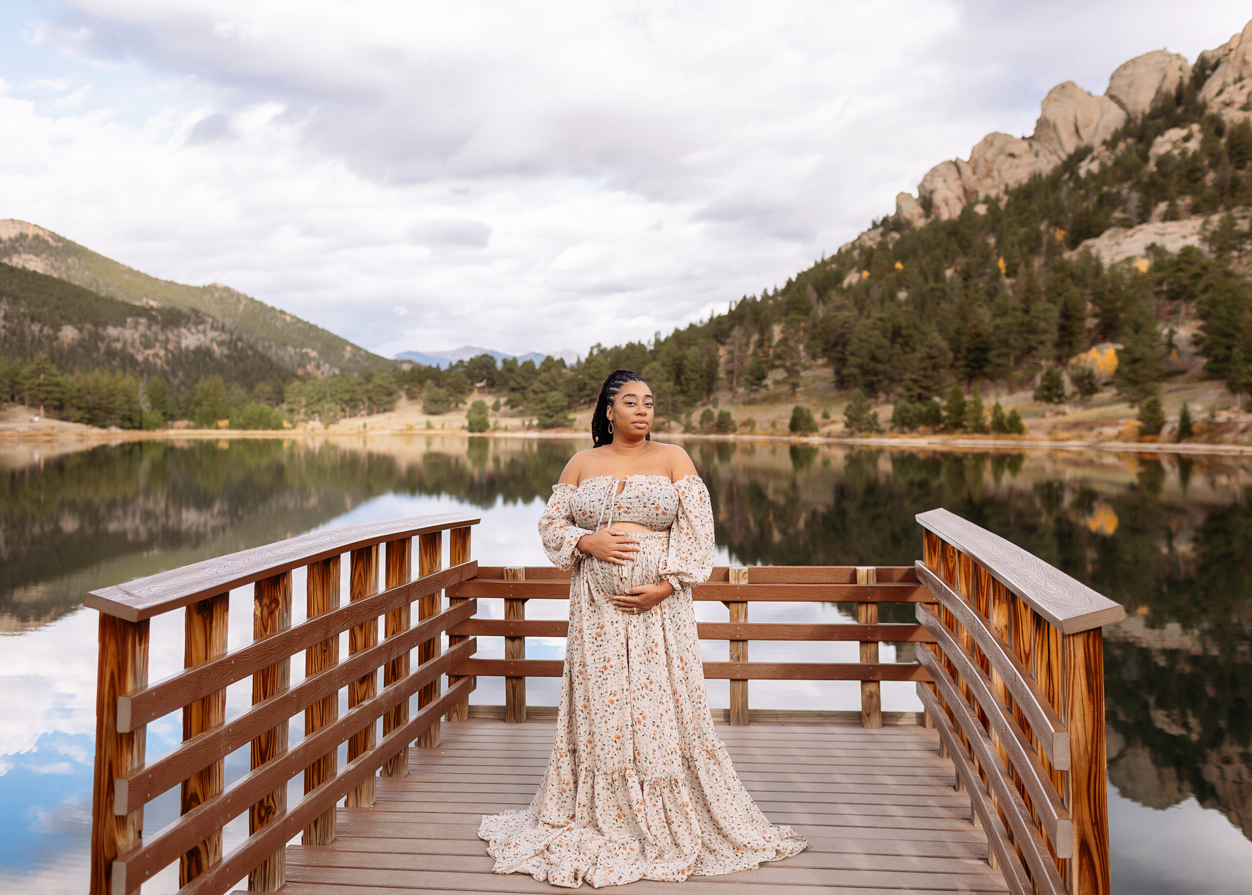 Rocky Mountain National Park maternity photography highlighting connection, movement, and the scale of the Colorado mountains